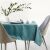 AmeliaHome Gaia teal tablecloth on table with tableware