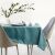 AmeliaHome Gaia teal embossed tablecloth on a set table