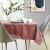 Elegant AmeliaHome Gaia rose tablecloth on a set dining table