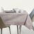 AmeliaHome Gaia powder pink embossed tablecloth on table with tableware