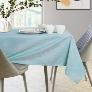 AmeliaHome Gaia kék dombornyomott asztalterítő egy megterített asztalon - AmeliaHome