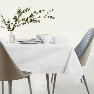 AmeliaHome Gaia white embossed oval tablecloth on a set table. - Tablecloth
