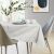 AmeliaHome Vesta cream embossed table runner in a modern dining room