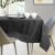 AmeliaHome Vesta graphite grey embossed tablecloth on a decorated table