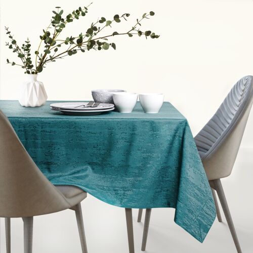 AmeliaHome Vesta Tischdecke in Teal mit Prägung auf einem Esstisch