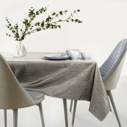 AmeliaHome Vesta cappuccino embossed oval tablecloth on dining table
