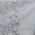 Close-up of water droplets on AmeliaHome Vesta grey embossed tablecloth