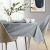 AmeliaHome Vesta grey embossed oval tablecloth in dining room setting