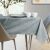 AmeliaHome Vesta grey embossed oval tablecloth 140x500 cm in dining room setting