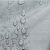 Close-up of water droplets on AmeliaHome Vesta grey embossed tablecloth