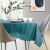 AmeliaHome Vesta teal embossed tablecloth on a dining table