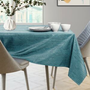 AmeliaHome Vesta teal embossed oval tablecloth on a set table. - Interior design