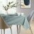 AmeliaHome Vesta mint green embossed tablecloth on a set table