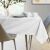 AmeliaHome Vesta white embossed table runner on dining table setting