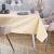 AmeliaHome Stardust yellow festive tablecloth on a set dining table