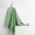 AmeliaHome Rubrum green towel draped on a white cube