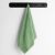AmeliaHome Rubrum green towel hanging on a black rack