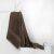 DecoKing Bamby brown towel 70x140 cm draped on a shelf
