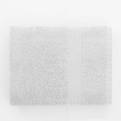 Folded white cotton Marina towel by DecoKing, 70x140 cm