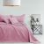 AmeliaHome SOFTA pink bedspread on a styled bed.