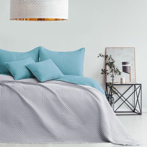 AmeliaHome Softa light blue and gray bedspread on a made bed