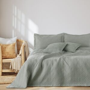 AmeliaHome Ophelia grey bedspread on a bed in a bedroom setting. - Interior design