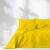 AmeliaHome OPHELIA yellow quilted bedspread 200x220 cm on a bed