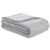 Folded AmeliaHome MEADORE grey bedspread with pompom trim