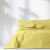 AmeliaHome Meadore yellow bedspread on a bed