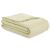Folded AmeliaHome Meadore beige bedspread with pom poms