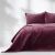 AmeliaHome Laila burgundy velvet bedspread on a bed