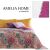 DecoKing Bibi bedspread on bed with pillows and Amelia Home logo