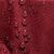 Close-up of AmeliaHome GAIA burgundy embossed table runner fabric with water droplets