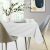Elegant dining table with AmeliaHome GAIA white embossed tablecloth