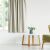 AmeliaHome Cream Blackout Curtain in Living Room Setting