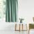 AmeliaHome mint green blackout curtain in a living room setting