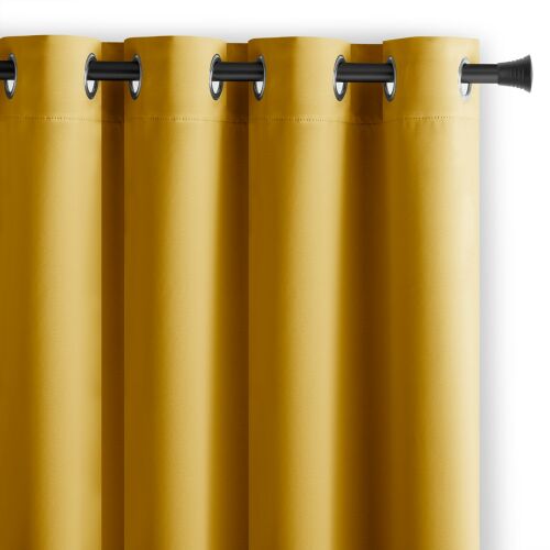 Close-up of AmeliaHome mustard yellow blackout curtain with silver grommets