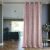 AmeliaHome Caspe rose gold blackout curtain in a living room setting
