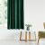 AmeliaHome Velvet glass green blackout curtain in a bright room.