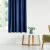 AmeliaHome indigo velvet curtain in a living room setting