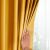 Close-up of AmeliaHome mustard yellow velvet curtain