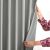 Demonstrating the Fabric of AmeliaHome Velvet Darkening Curtain