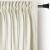 AmeliaHome cream velvet curtain hanging on a rod