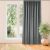 VILA graphite grey blackout curtain hanging in a living room setting, 135x175 cm