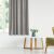 VILA grey blackout curtain in a bright living room setting