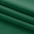 Close-up of the velvet fabric of the VILA glass green blackout curtain.
