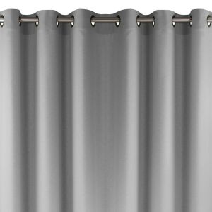 Carmena gray blackout curtain with silver metal grommets, close-up - Interior design