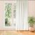 MILANA cream blackout curtain in living room setting