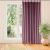 MILANA light purple blackout curtain hanging in front of a window