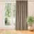 VILA beige blackout curtain in a bright living room